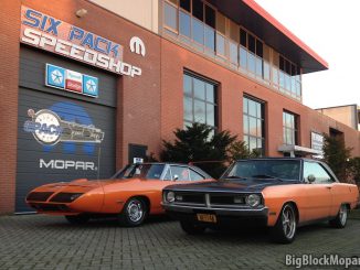 1973 Dodge Dart next to 1970 Plymouth Superbird at SixPack Speedshop