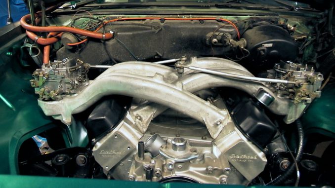 Engine bay filled with almost 500 cubic inches and a pair of long ram intakes