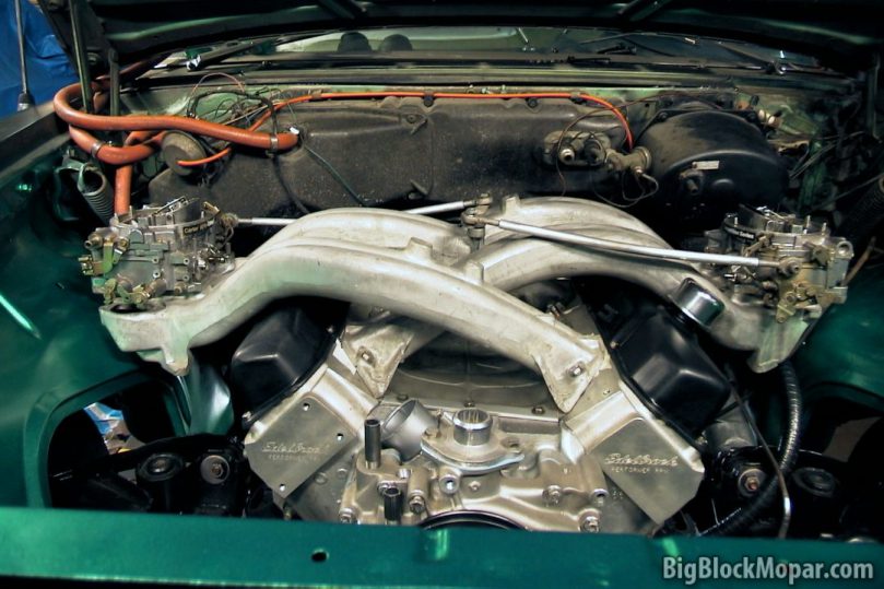 Engine bay filled with almost 500 cubic inches and a pair of long ram intakes
